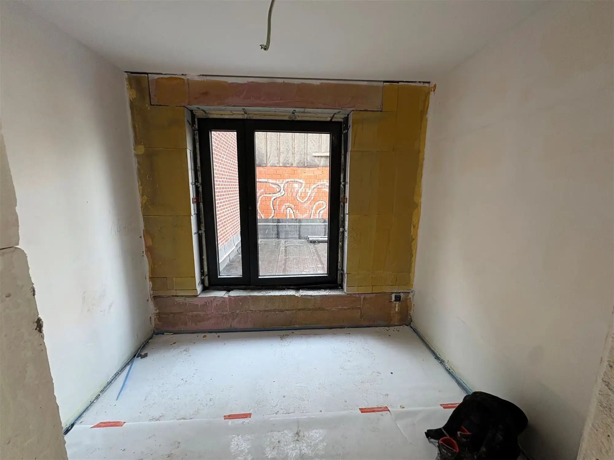 Gelijkvloersappartement met 2 slaapkamers en tuin. foto 11