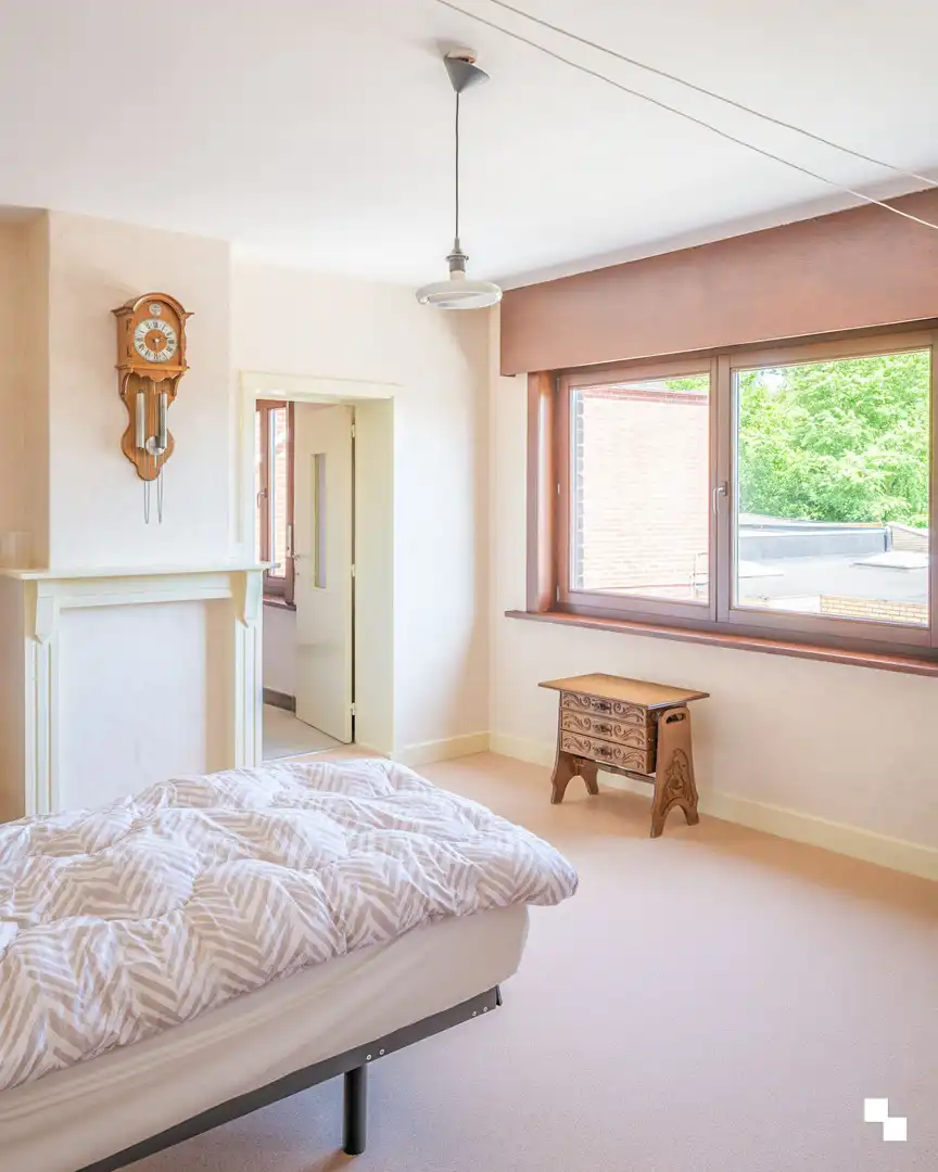 Op te frissen woning met gezellige tuin in het hart van Merelbeke foto 14