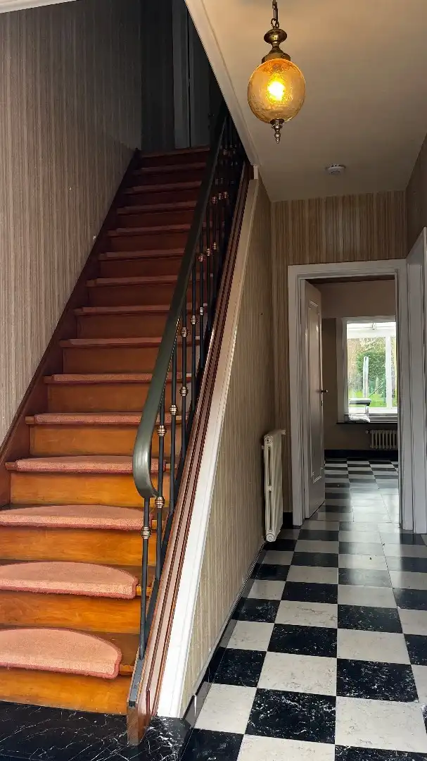 Grote woning met mogelijks vier kamers, garage en ruime tuin foto 12