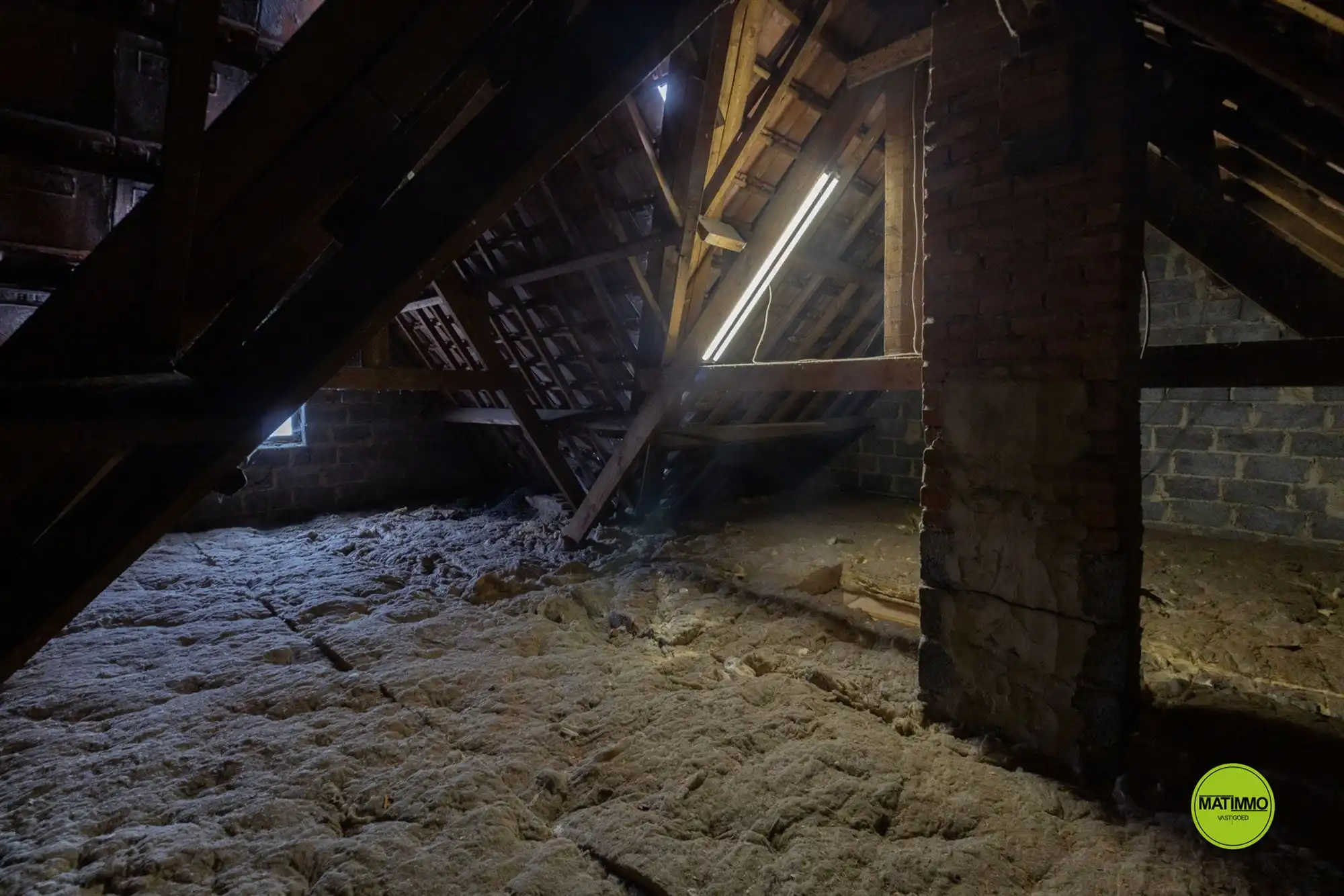 Halfopen woning met veel potentieel in het centrum van Bree foto 22