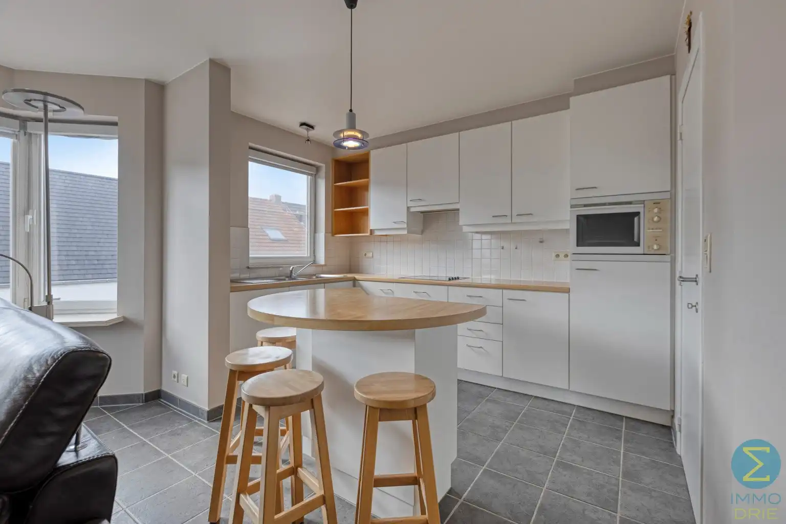 Ruim 2-slaapkamerappartement met balkon, garage én kelder  foto 7