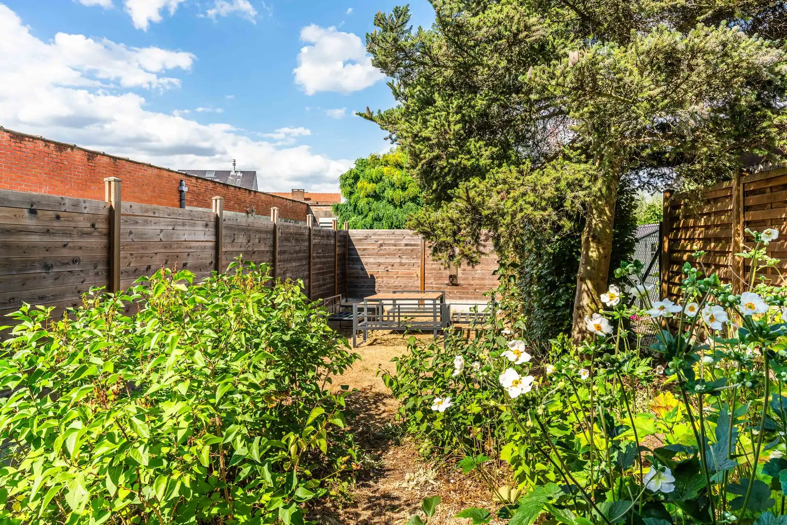 Gelijkvloers appartement met tuin foto 9
