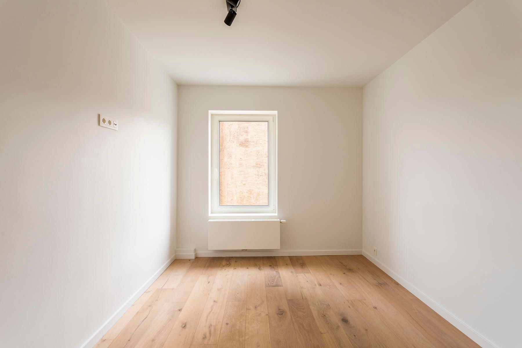 Gerenoveerd 2 slaapkamer appartement in hartje Wommelgem foto 7