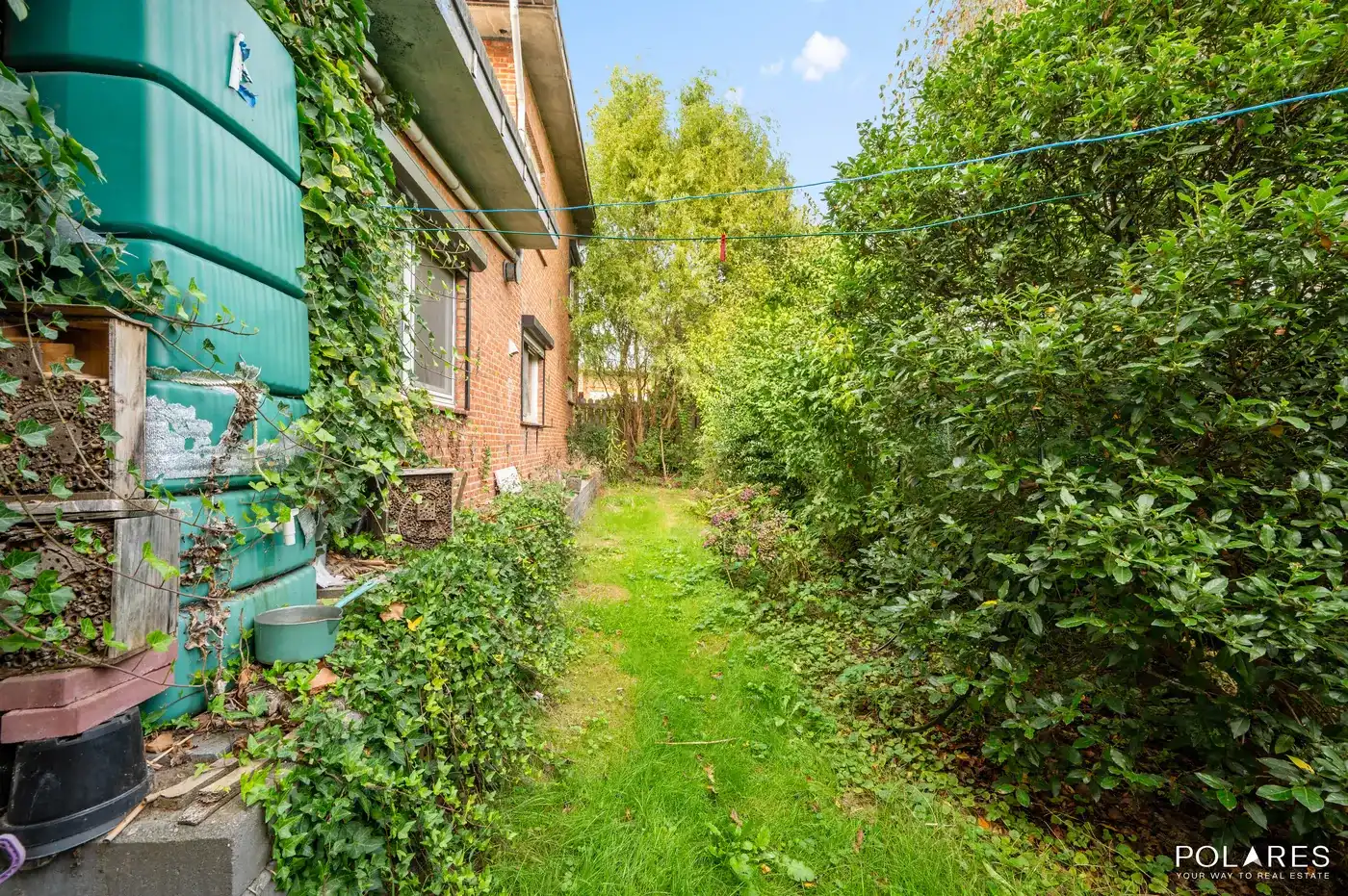 Op te frissen open bebouwing met 4 slaapkamers, groene tuin en garage in Werchter foto 18