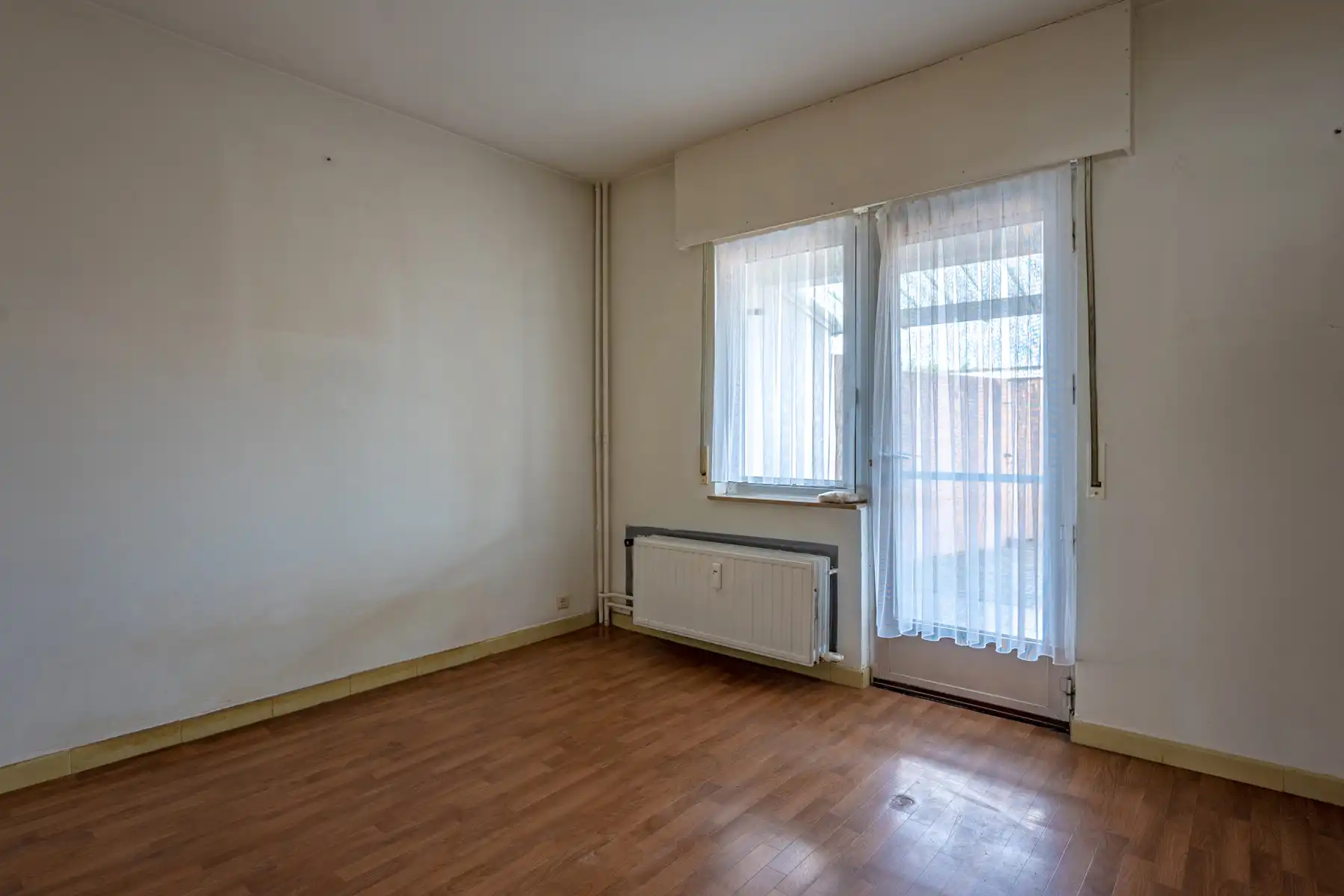 Te renoveren gelijkvloers appartement met 2 slaapkamers en garagebox! foto 7