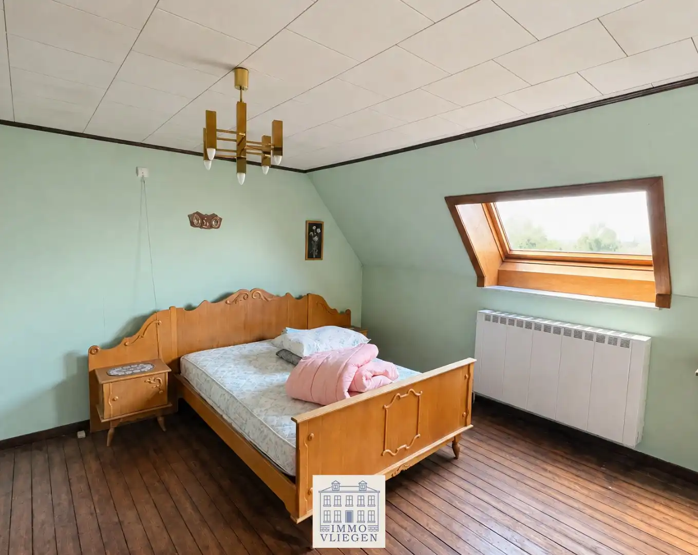 Te renoveren vrijstaande woning met ruime tuin op perceel van circa 800 vierkante meter in Neeroeteren foto 22