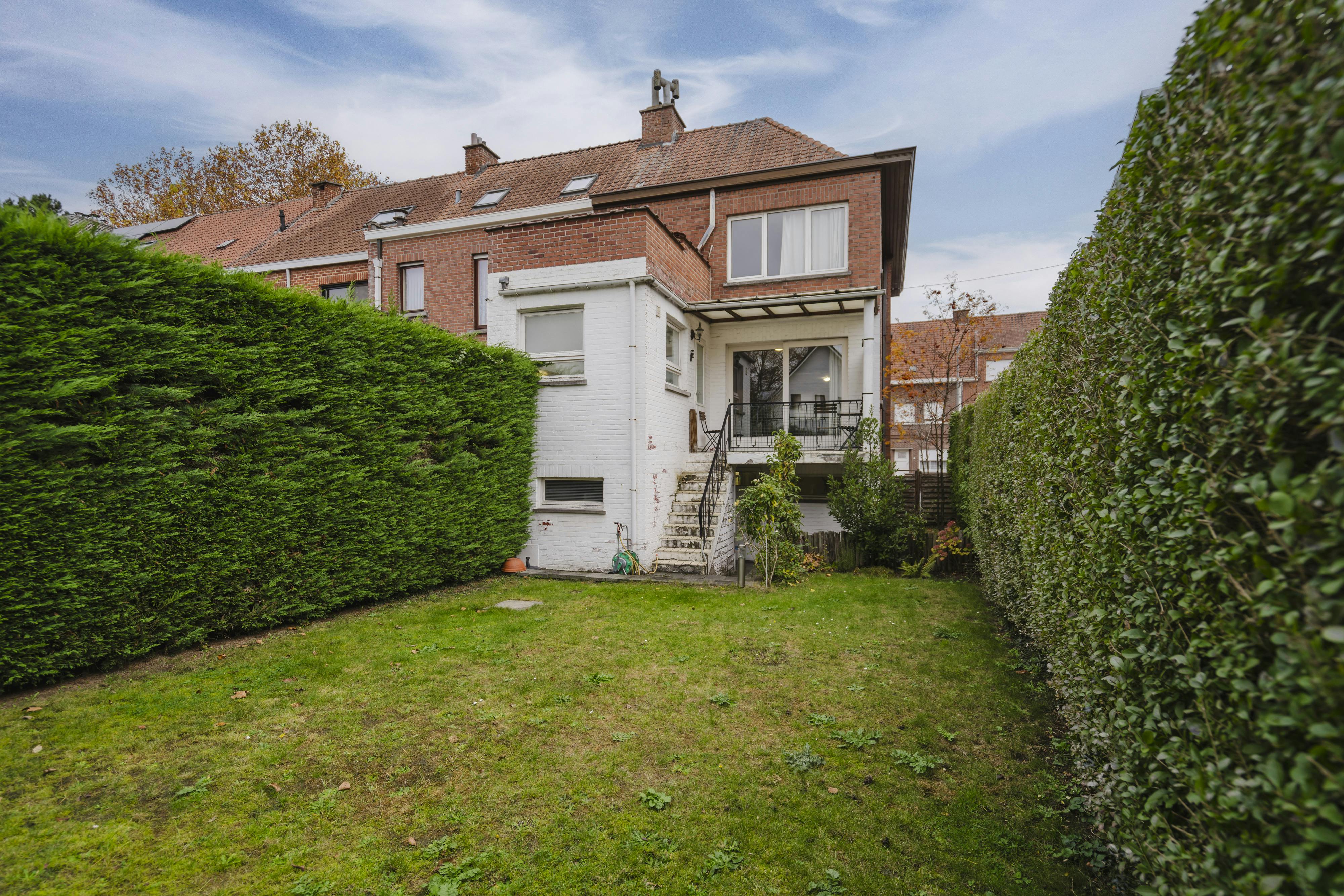 Halfopen bebouwing met 3 slaapkamers te koop in Kortrijk! foto 9