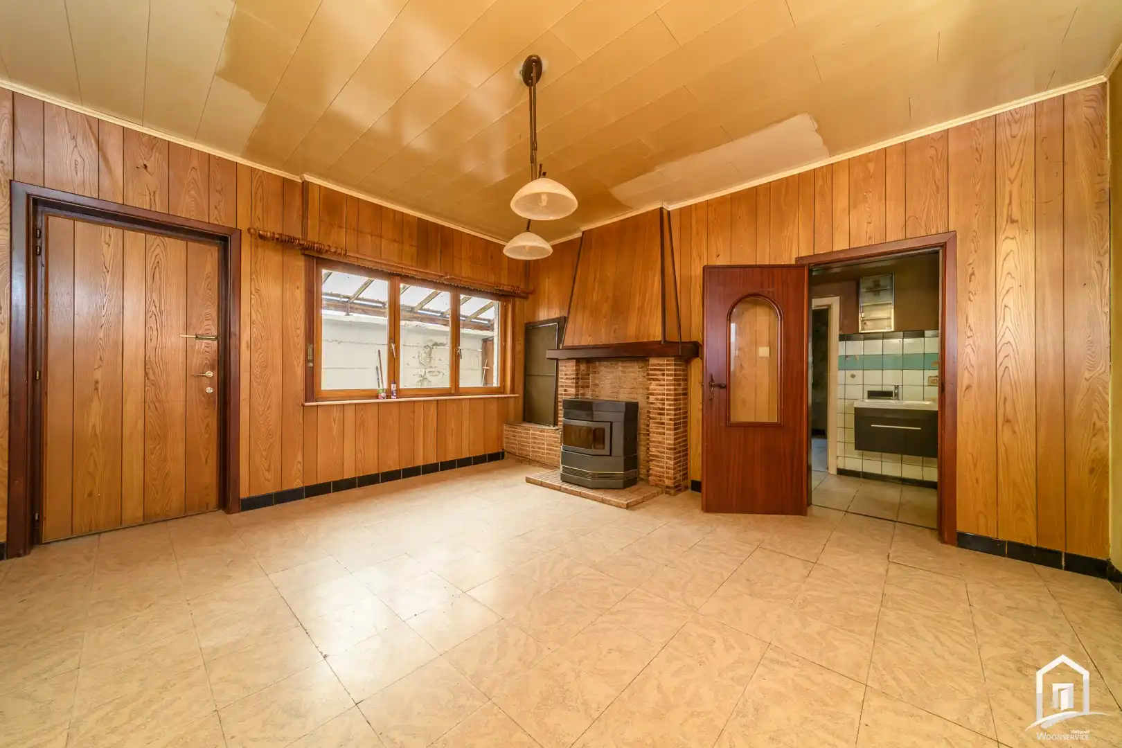 Te renoveren gezinswoning met 2 slaapkamers en ruime tuin foto 6