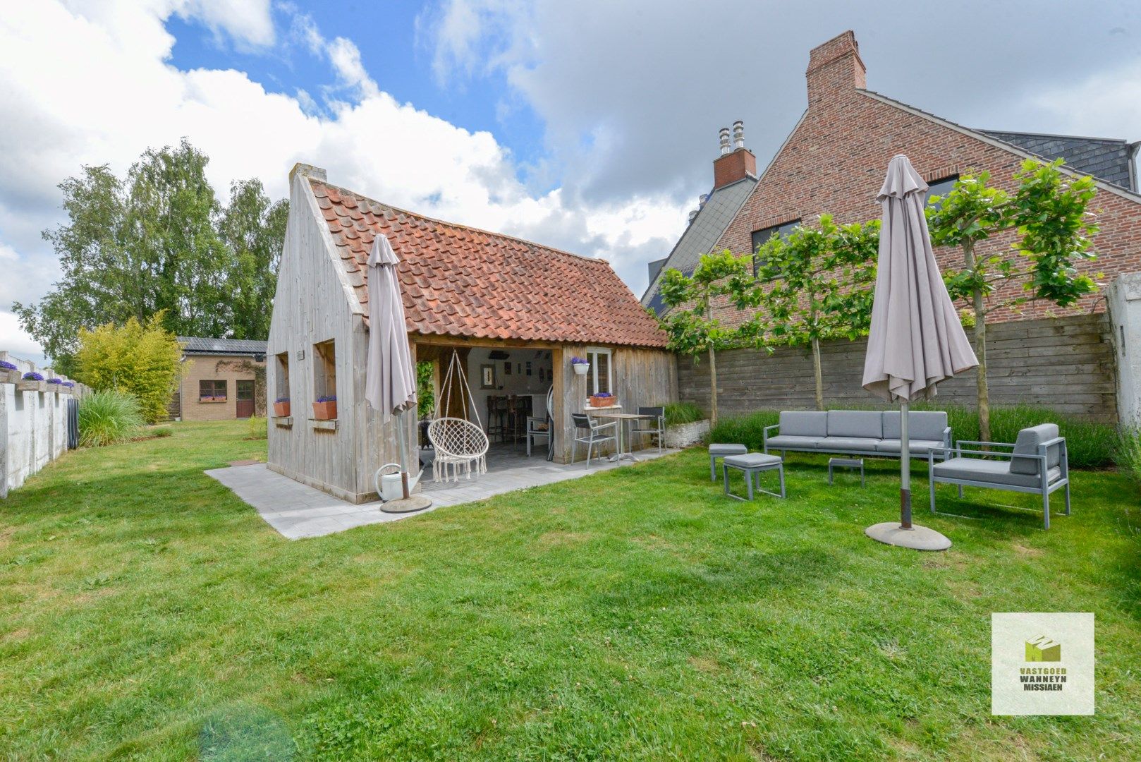 Halfopen bebouwing met 3slpk, 2 bijgebouwen en diepe tuin foto 20