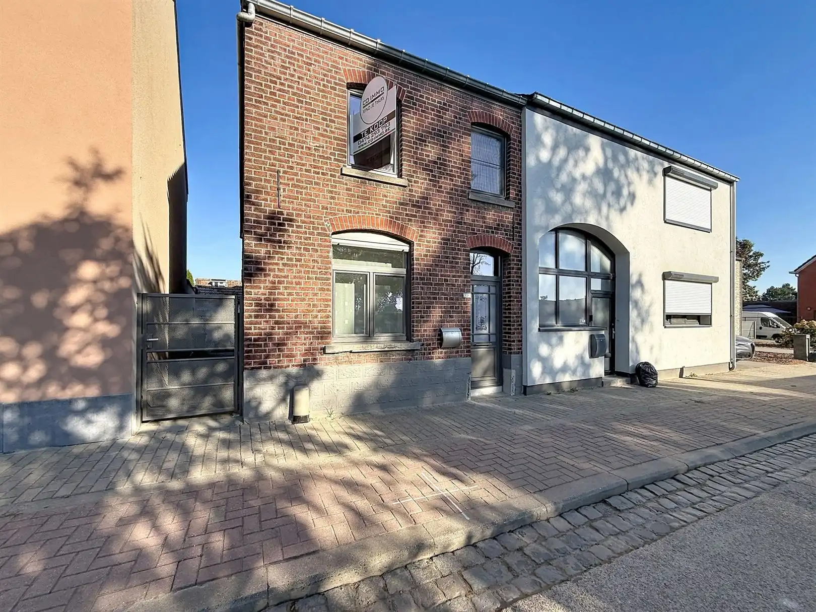 Op te frissen woning met binnenkoer, tuin, 3 slpks foto 2