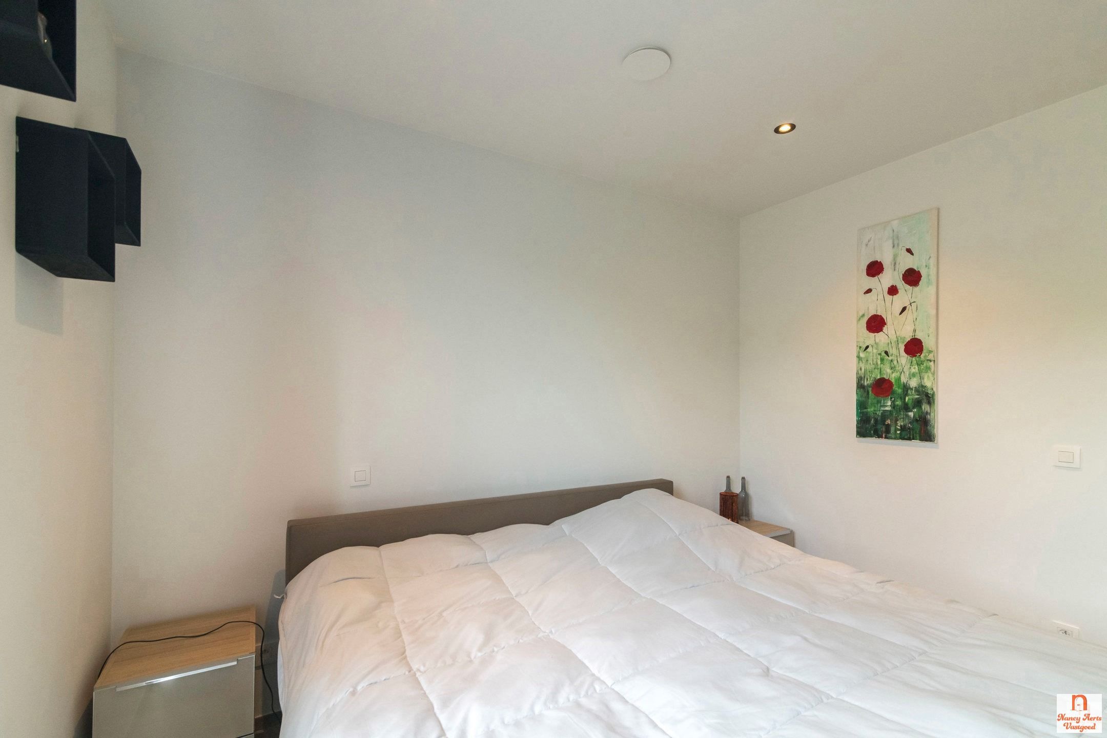 Ruimtelijk wonen met verfijnde afwerking in hartje Koersel foto 34