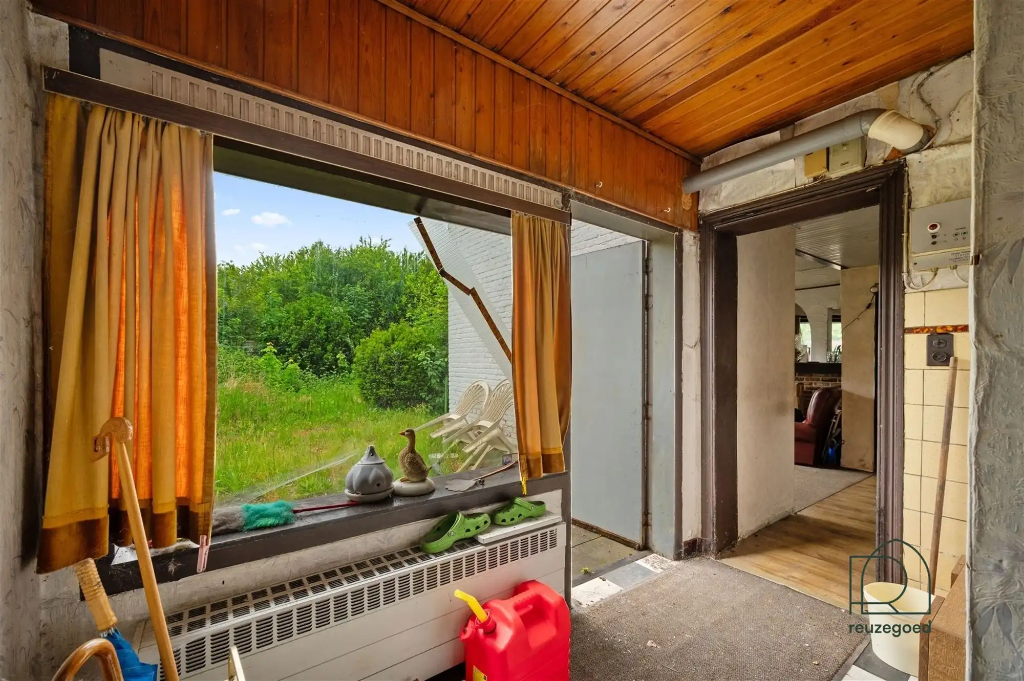 Te renoveren huis (tweewoonst)  met mogelijkheid tot 2 bouwgronden foto 12