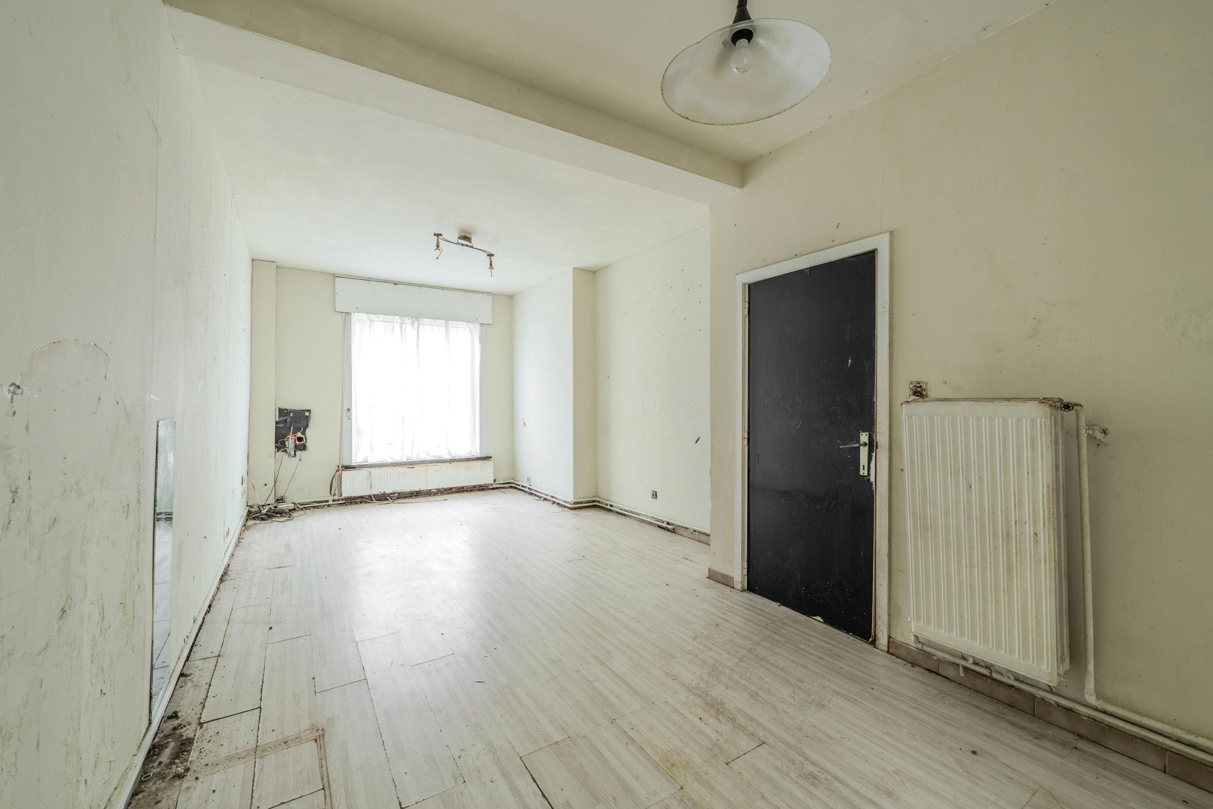 Te renoveren woning met 4 slaapkamers te Oostende foto 2
