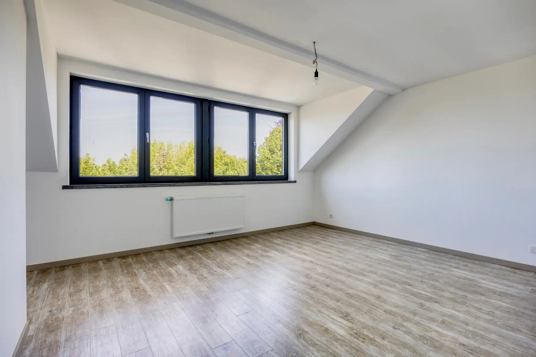 Nieuwbouw triplex met 4 slaap- en badkamers, tuin en parking foto 11