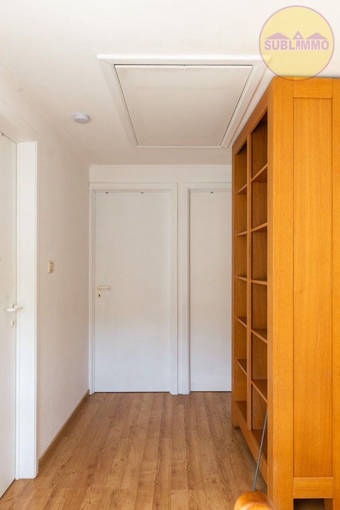 Ruime woning met afzonderlijk appartement op een perceel van 858 m² in Mol. foto 11