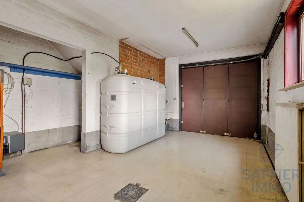 Ruime gezinswoning met zonnige tuin en 5 slaapkamers in hartje Izegem foto 22