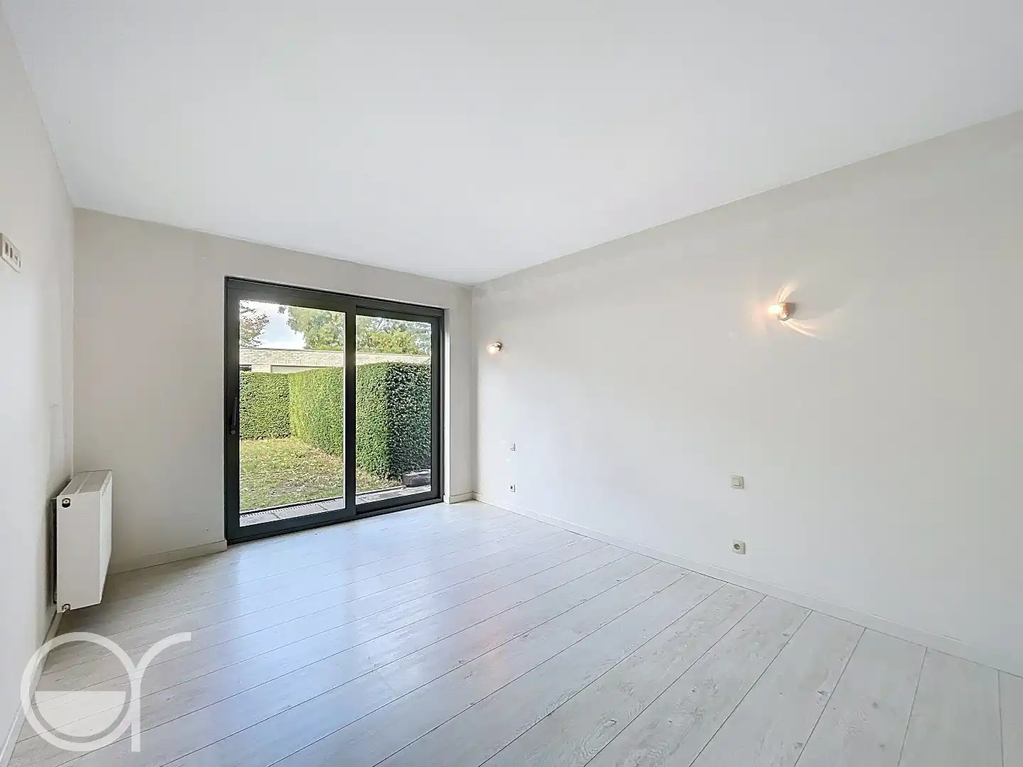 Ruim gelijkvloers appartement met twee slaapkamers, grote tuin én garagebox foto 9