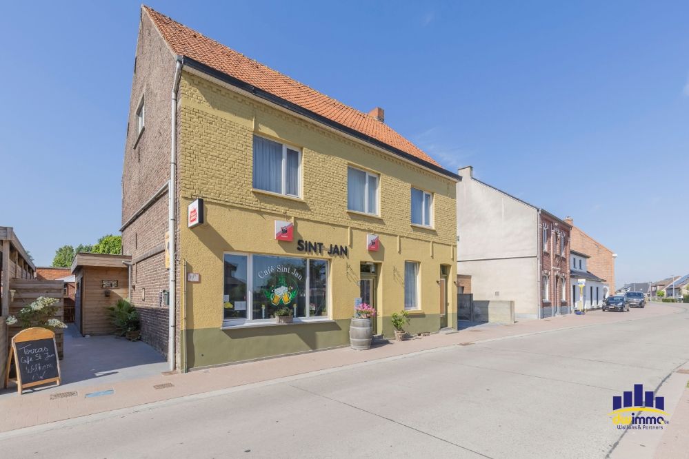Twee panden te koop als één geheel – Unieke kans tegenover de kerk van Sint-Jan foto 9