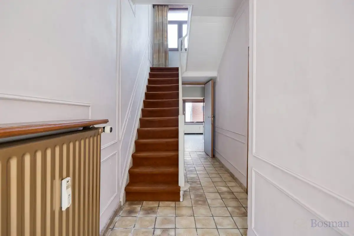 Te renoveren woning met 5 garageboxen te koop in Ham foto 3