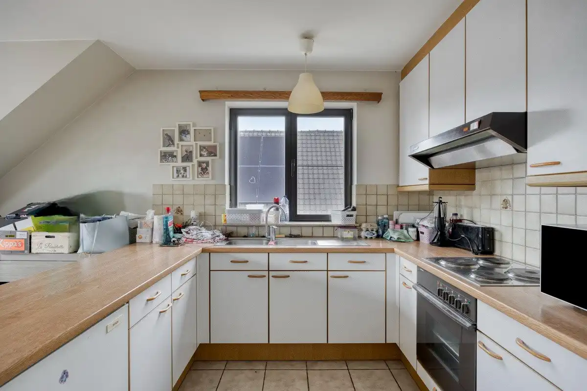 Opbrengsteigendom met 3 appartementen en 7 garages foto 17