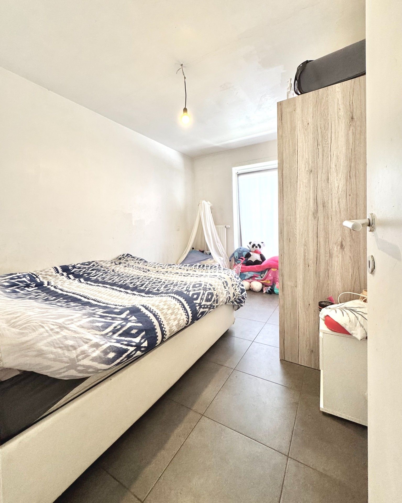 GELIJKVLOERS APPARTEMENT MET 2 SLPKS EN TUIN foto 7