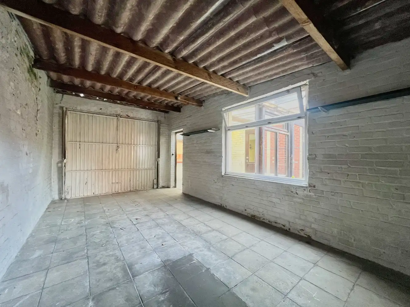 Karaktervolle gezinswoning met zonnige tuin + garage foto 16