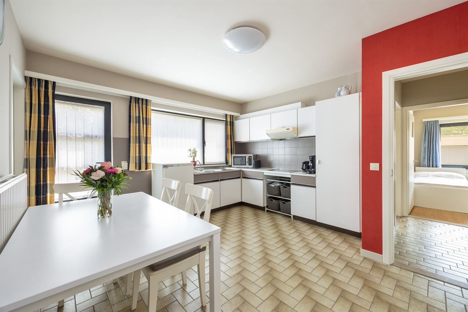 Lichtrijk gelijkvloers appartement met XXL-garage! foto 6