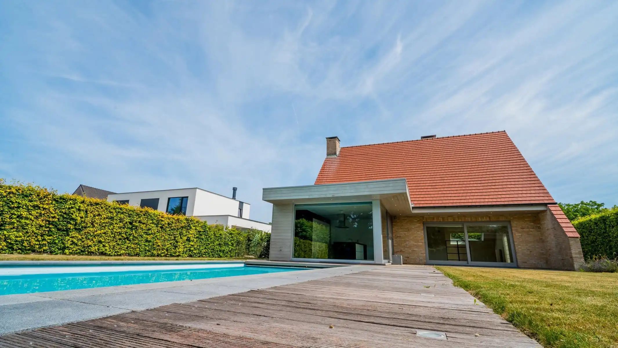 Knappe villa met zuidgerichte tuin, zwembad en poolhouse foto 7