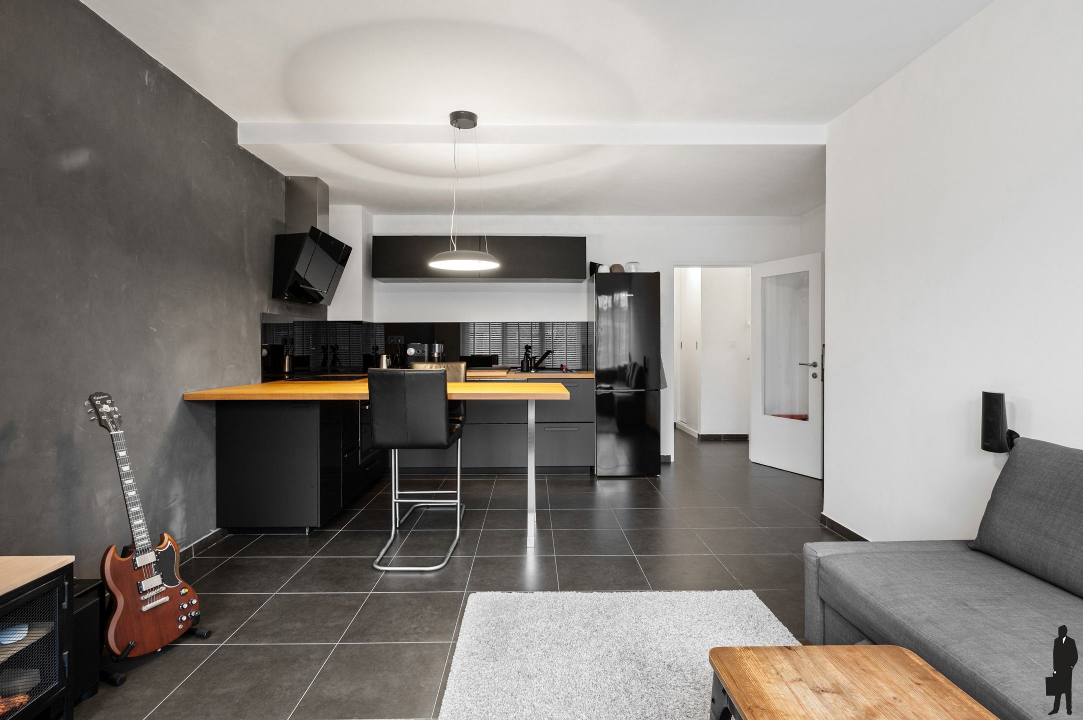 Instapklaar appartement met terrasje in Borsbeek foto 4