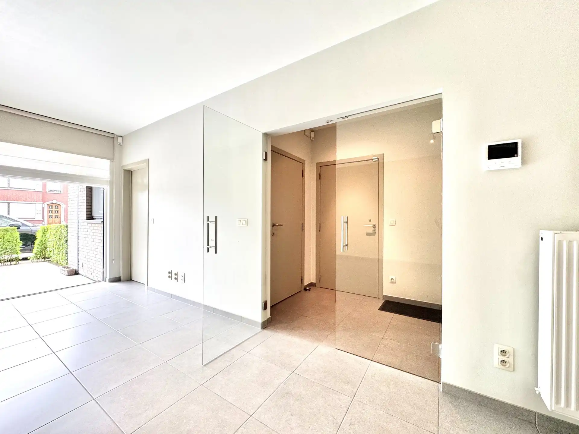 GELIJKVLOERS APPARTEMENT | VOOR- EN ACHTERTUIN | 2 KAMERS | GARAGE | 140 M² foto 13