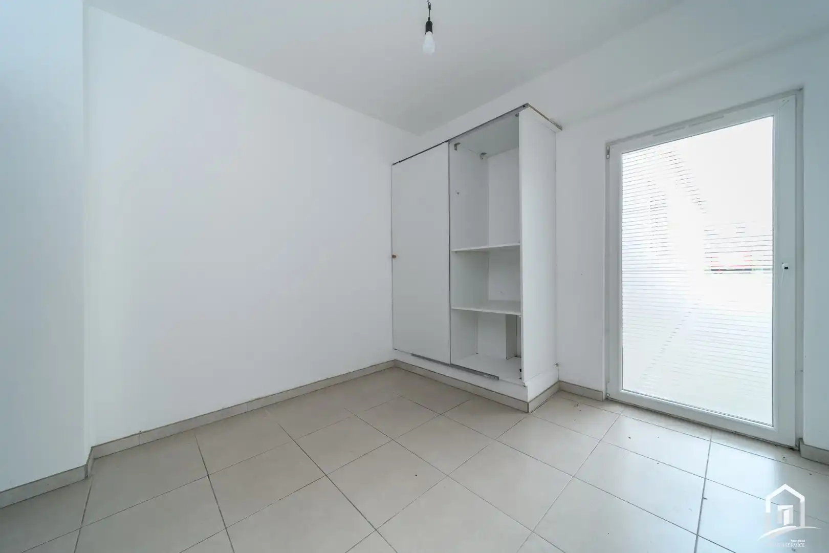 Ruim en energiezuinig gelijkvloersappartement met terras en autostaanplaats foto 17