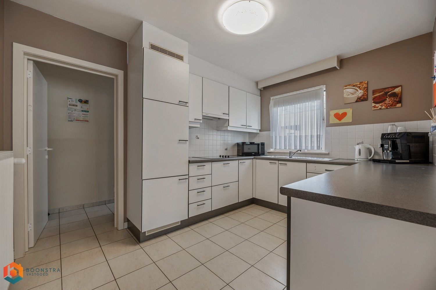 Ruim appartement (124m2) met 2 slpkrs, garage en terras foto 3
