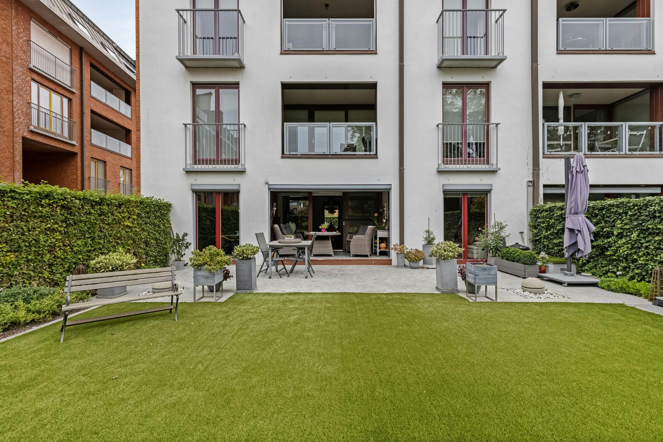 Appartement met tuin en garage in Kortrijk centrum foto {{pictureIndex}}