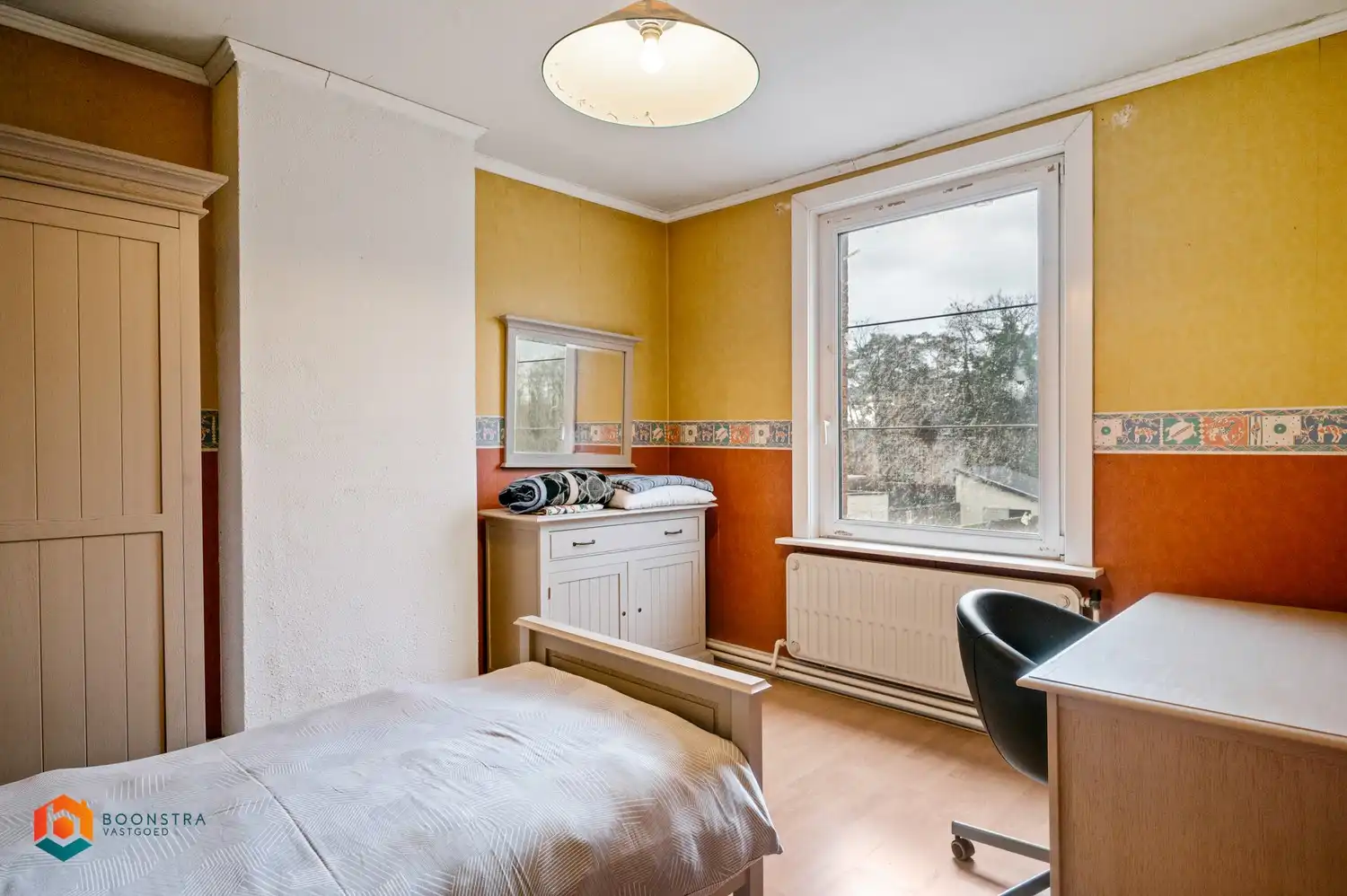 Te renoveren woning met 3 slaapkamers, tuin en garage foto 13