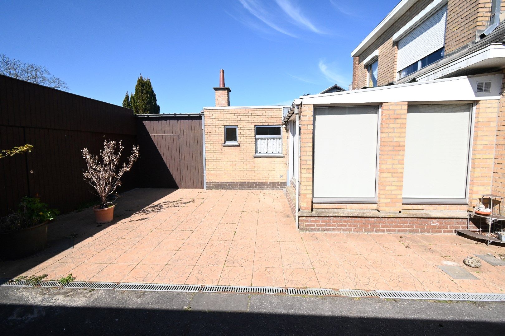 Halfopen bebouwing met garage en tuin foto 20