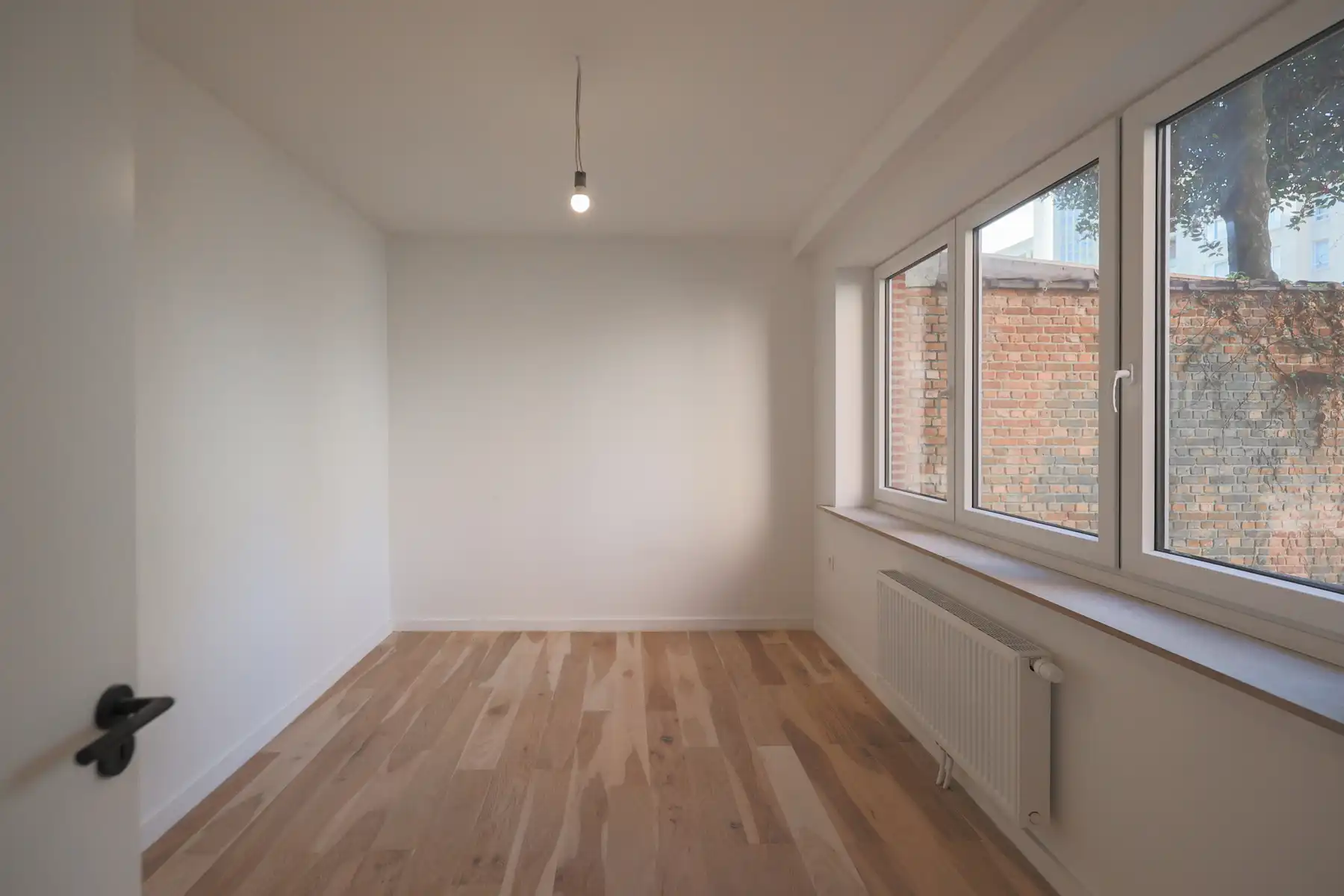 Gelijkvloers 3 SLK appartement met tuin en 2 badkamers foto 12