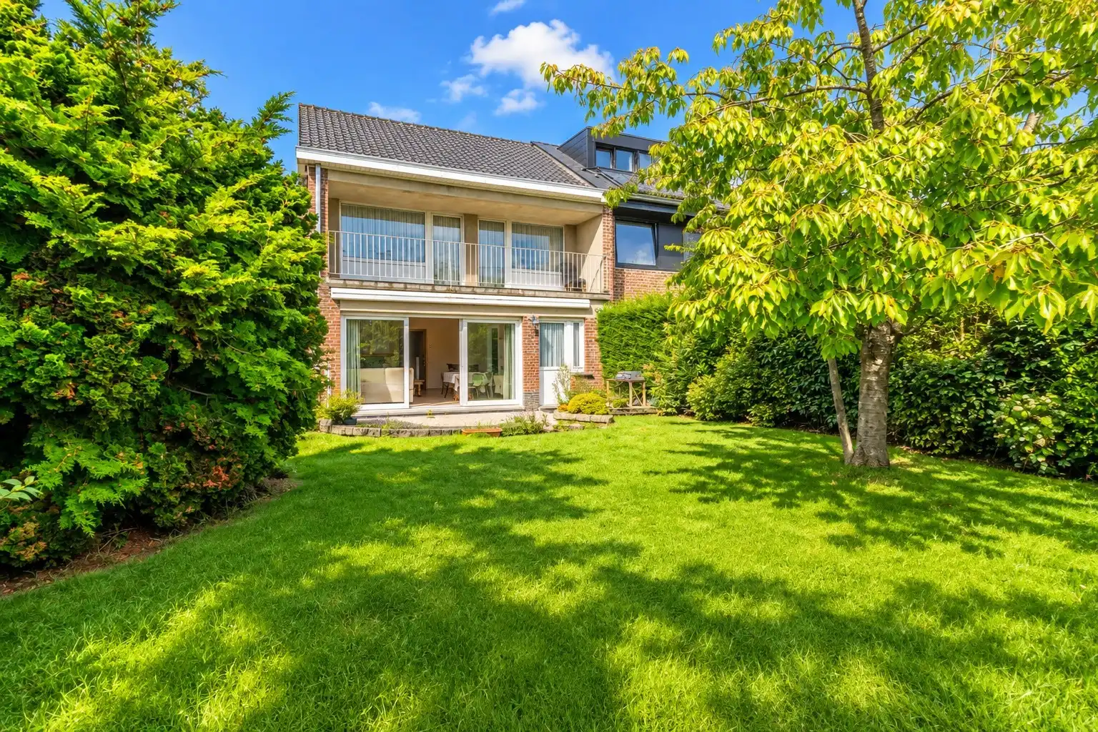 RUSTIG GELEGEN WONING MET 4 SLP, GARAGE & ZUID-TUIN ! foto 6