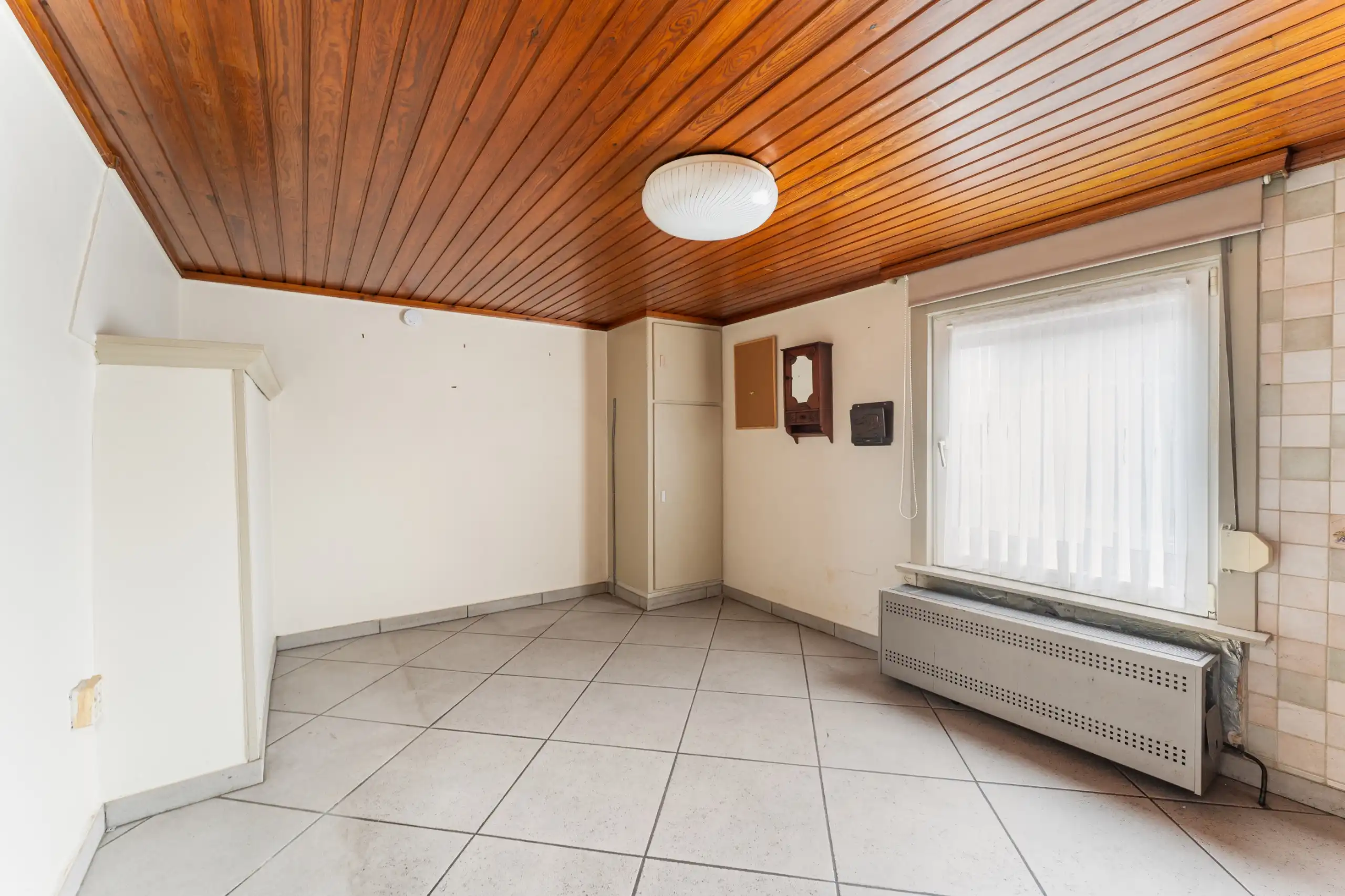 Voormalig te renoveren handelspand met woonst foto 12