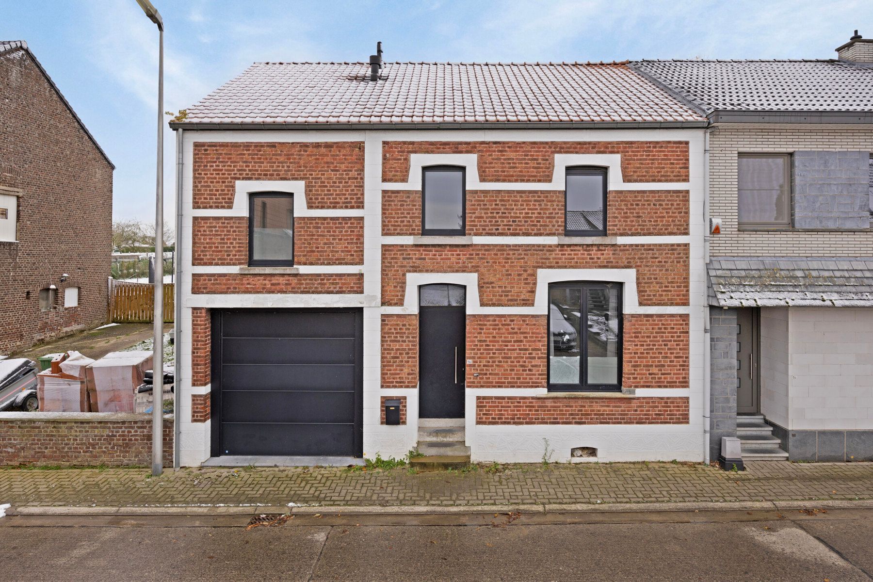 Gerenoveerde eengezinswoning met garage en tuin te Gingelom foto 2