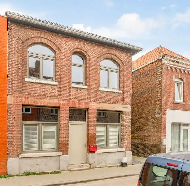 Handelsruimte met woonappartement in het centrum van Wommersom foto {{pictureIndex}}