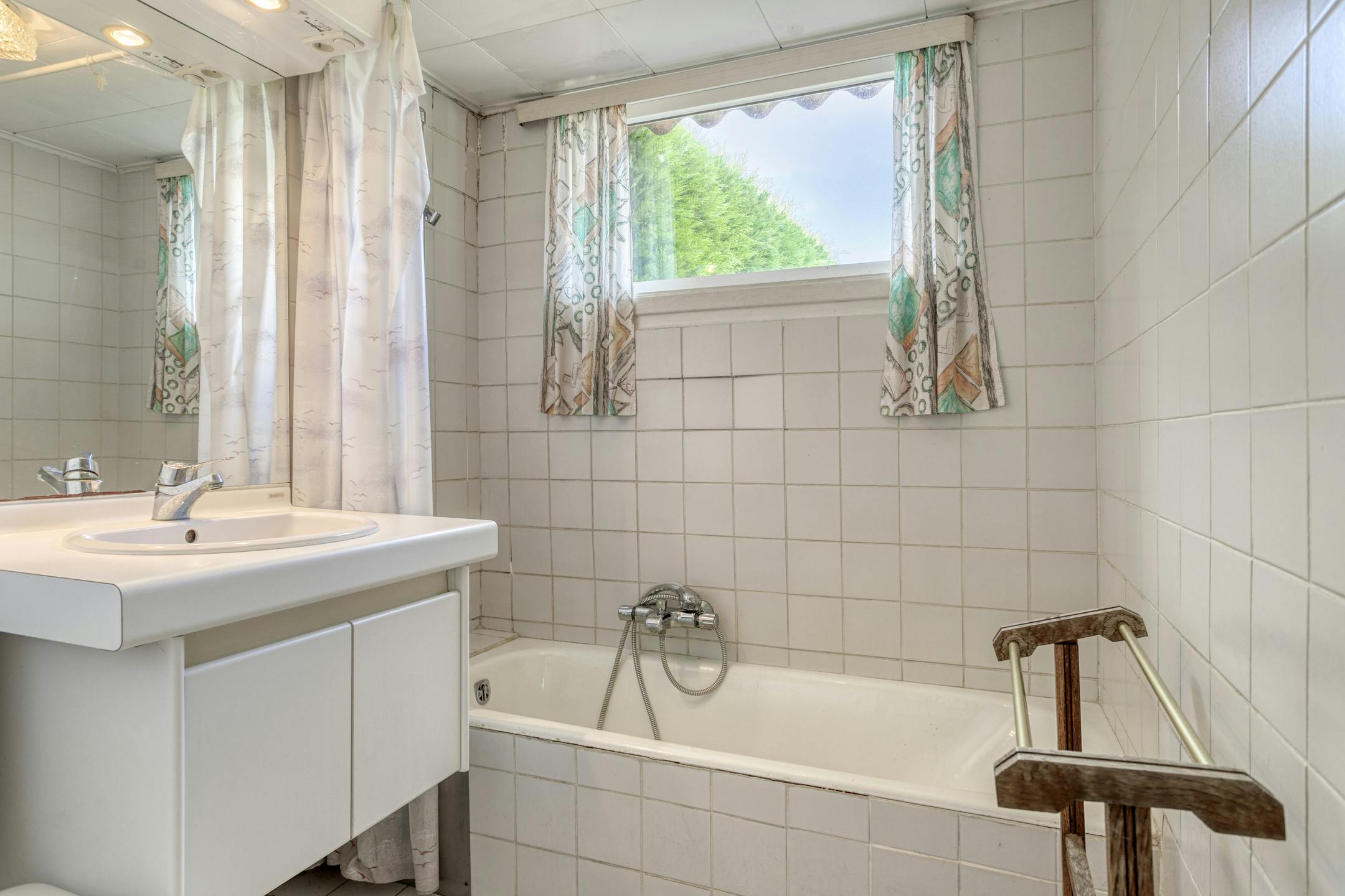 Karaktervol huis met zonnige tuin, 3 slaapkamers én garage met uitweg foto 11