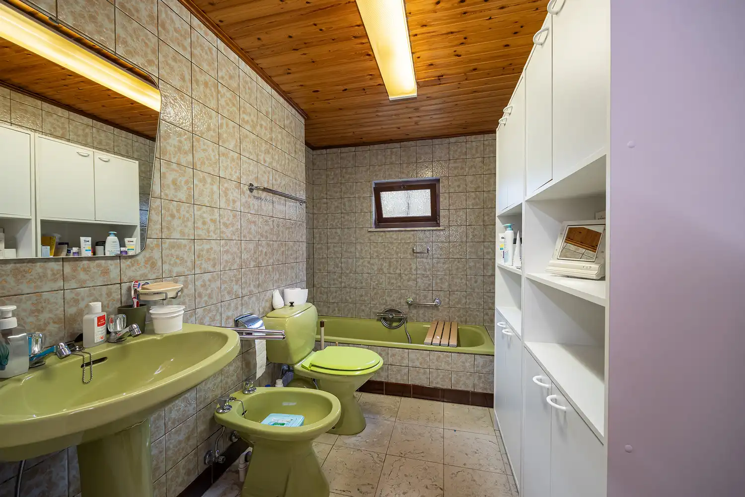 Halfopen woning op 575 m² met garage, carport en diepe tuin – te renoveren foto 12