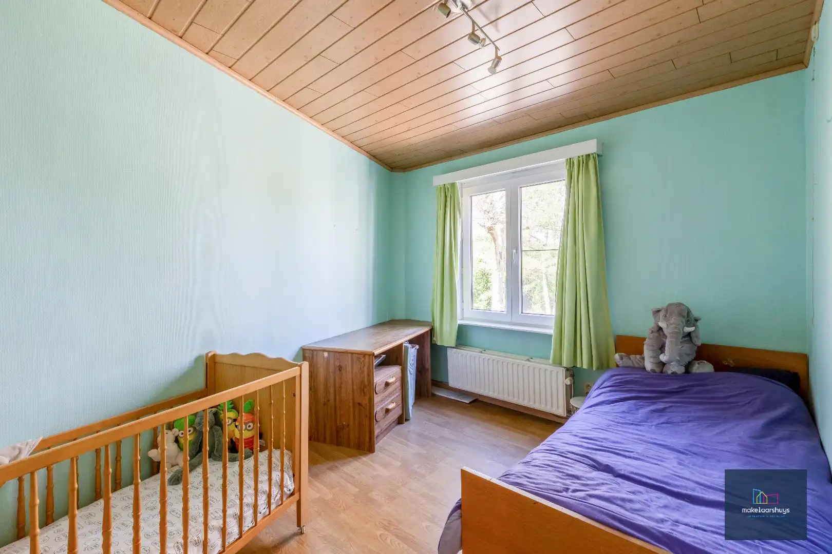 Goed onderhouden en ruime woning in rij met tuin/terras te Wondelgem foto 17