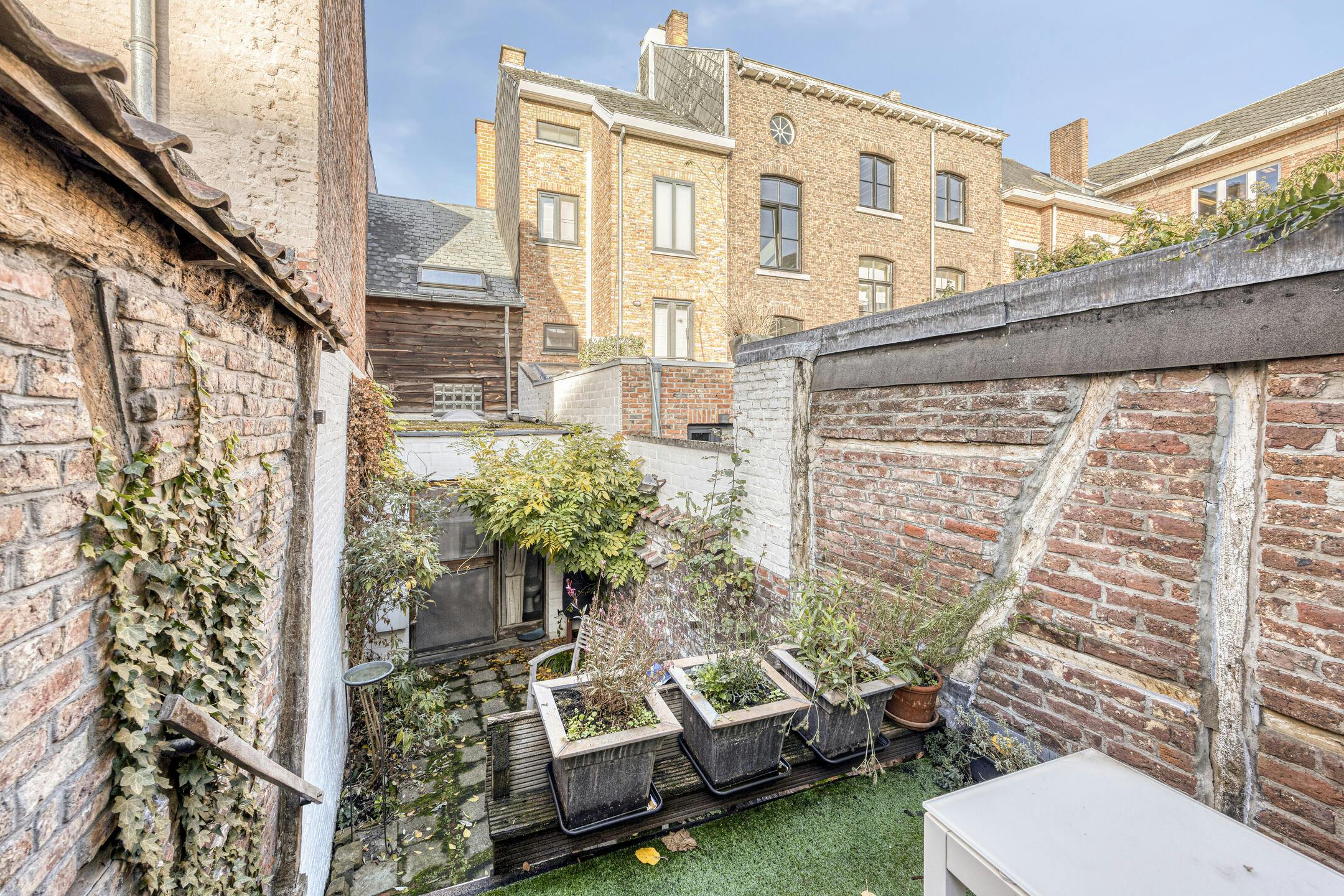 Op te knappen stadswoning met tuin in hartje Hasselt	 foto 17