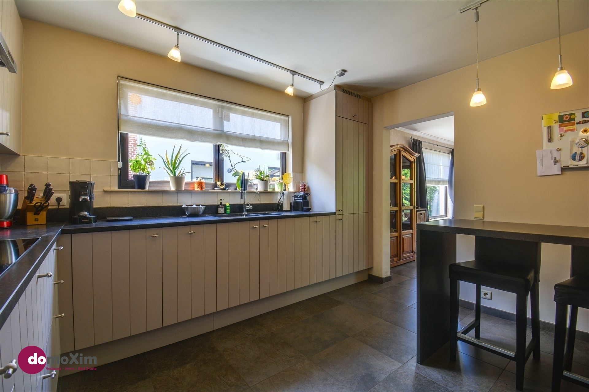 Instapklare woning met zonnige tuin vlak bij het centrum van Boortmeerbeek foto 10