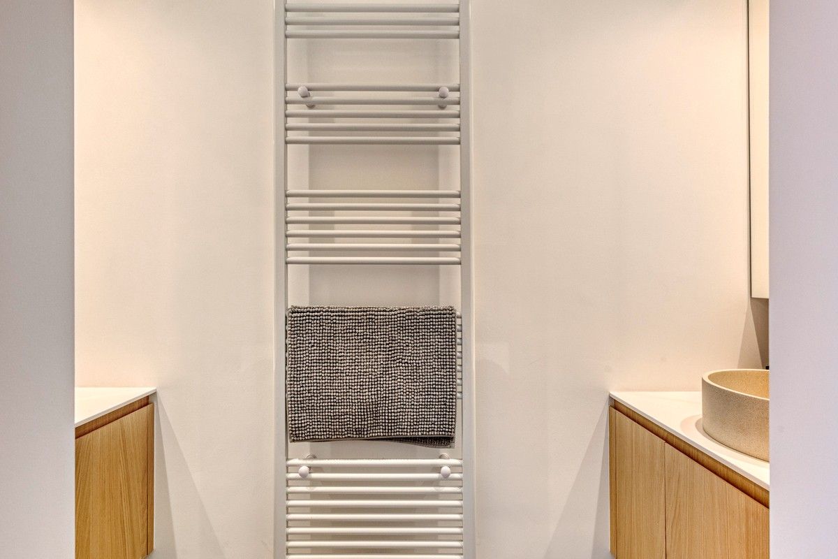 Elegant en tijdloos gerenoveerd appartement met 3 grote slaapkamers. foto 15