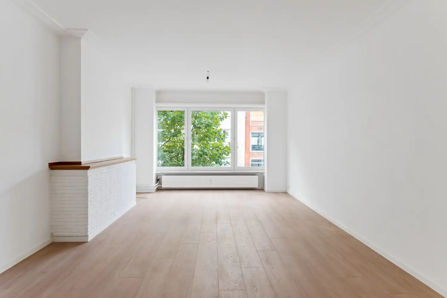 Licht en ruimte in het hart van Antwerpen – 1 slaapkamer appartement foto 2