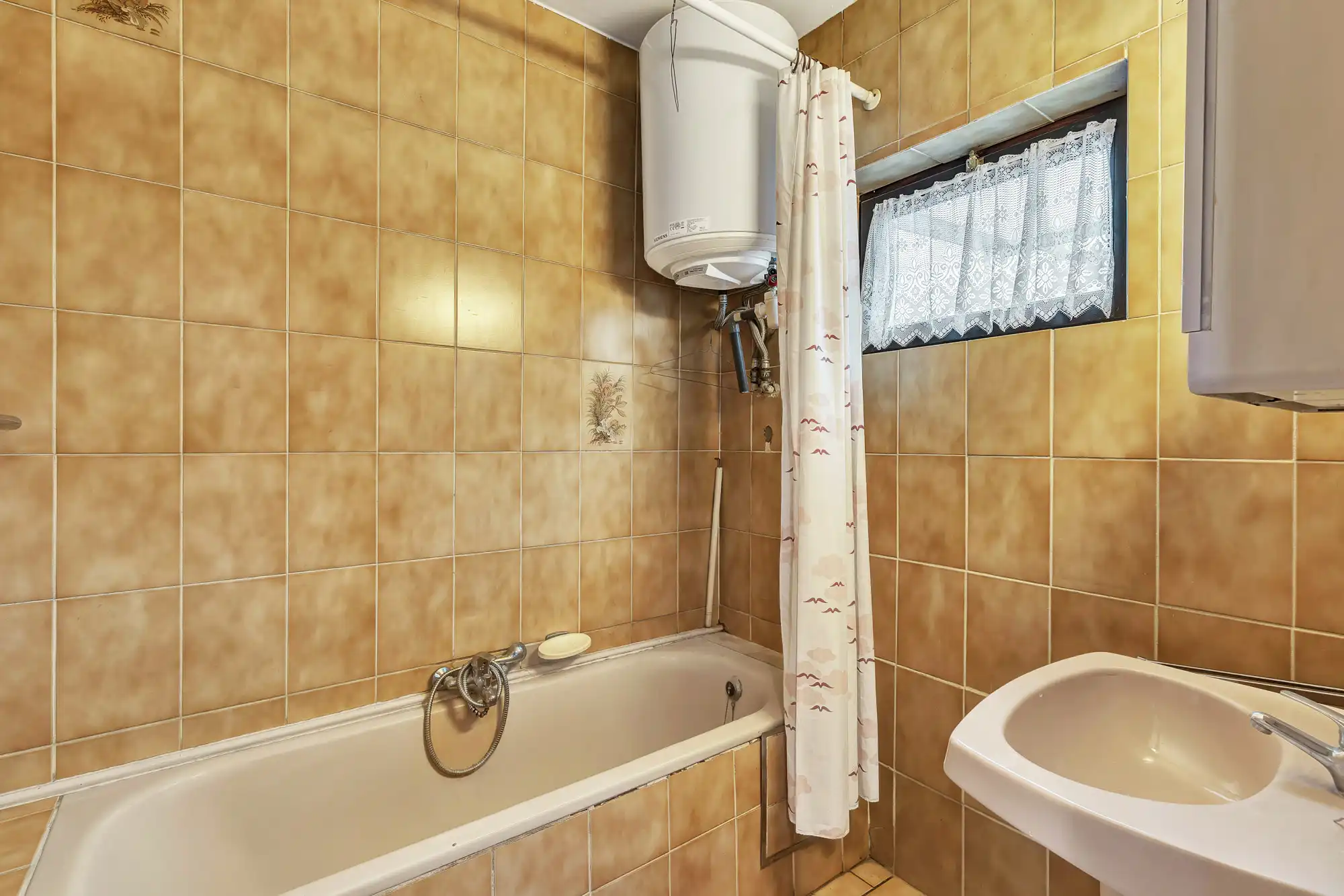 Goed onderhouden ruime rijwoning met tuin foto 11