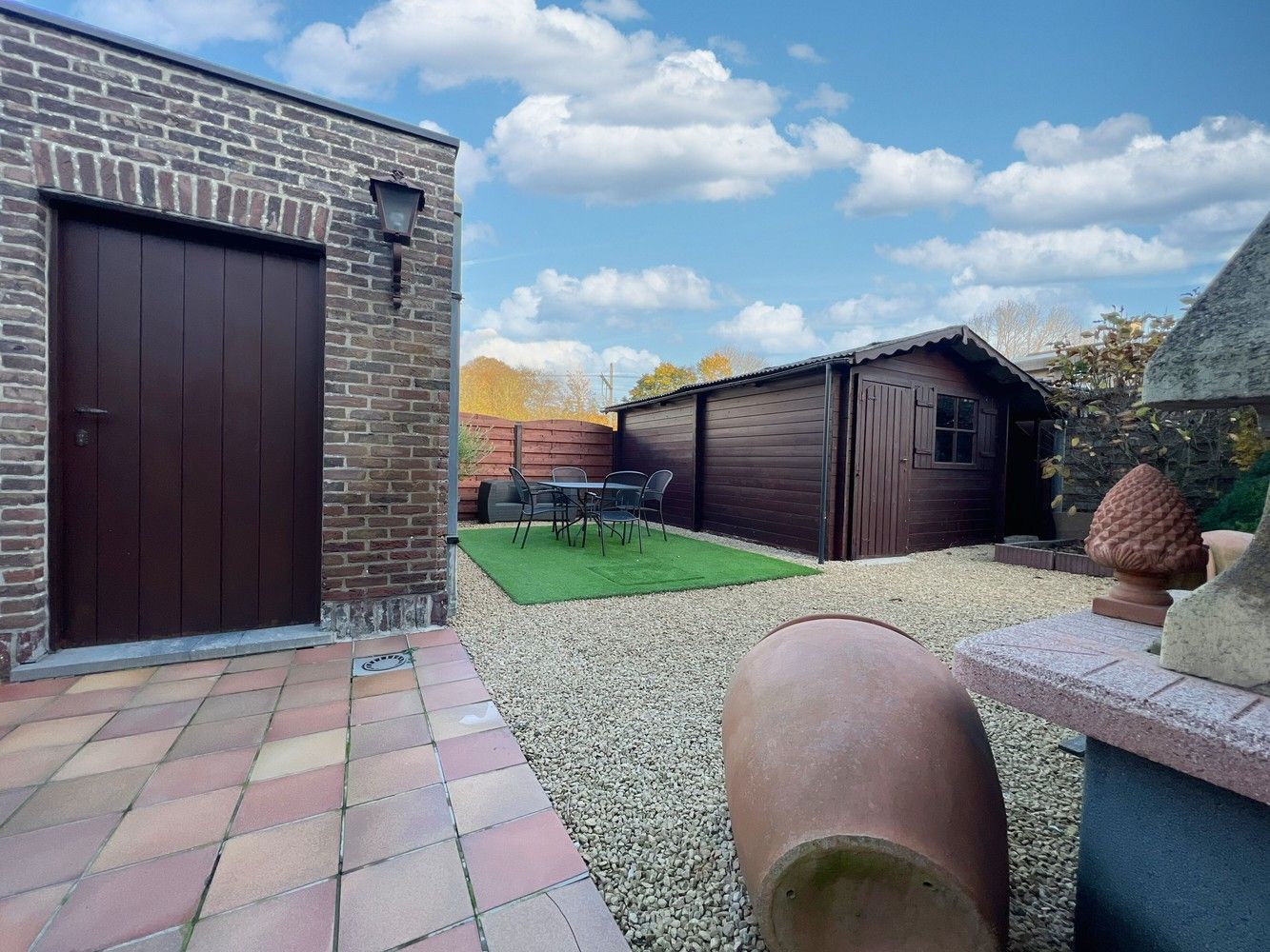 Topper! Stijlvolle woning met zonnige tuin + 2x garage foto 18