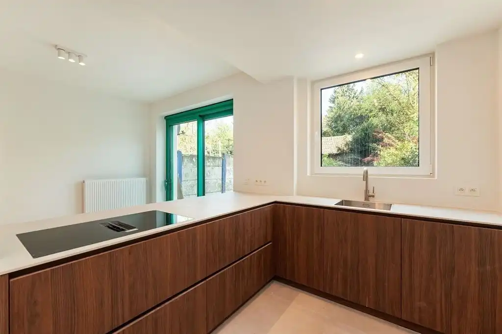 Luxueus afgewerkt appartement met tuin foto 6